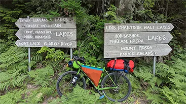 signage to the various rec sites on the 10 lakes overnighter bikepacking trip